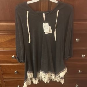NWT adorable grey thin hooded top. Embroidered bottom and white fringes.